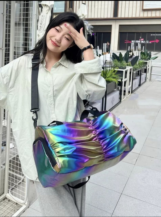 Iridescent duffel bags in various colors